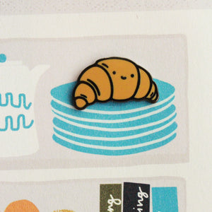 happy croissant enamel pin